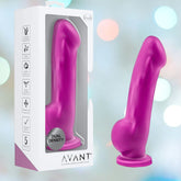 The Avant D7 Ergo 7.5" Non-Porous Silicone Dildo by Avant is shown in violet with its packaging, which features dual density, body-safe platinum-cured silicone, and a 5-year warranty. The background has a soft, light bokeh effect.